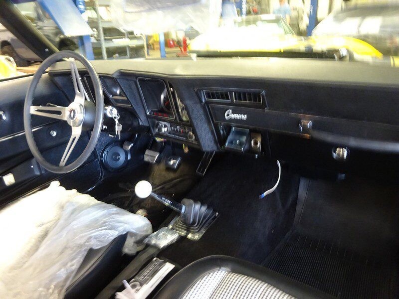 Classic Camaro interior dashboard view.
