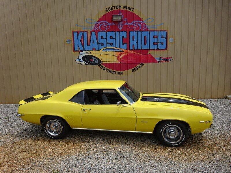 Yellow Camaro classic car for sale.