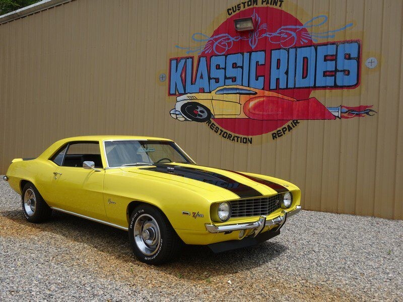 Yellow Camaro classic car restoration.
