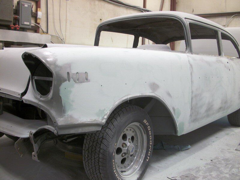 Classic car body in primer, restoration.