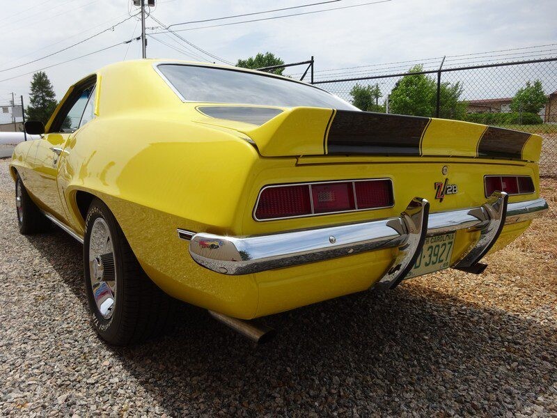 Yellow 1969 Camaro Z28 rear view.