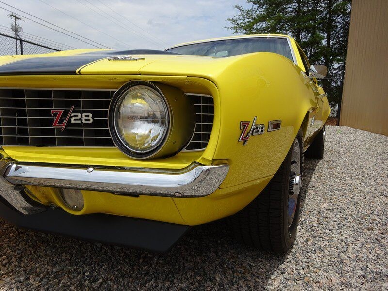 Yellow 1969 Camaro Z/28 front view.