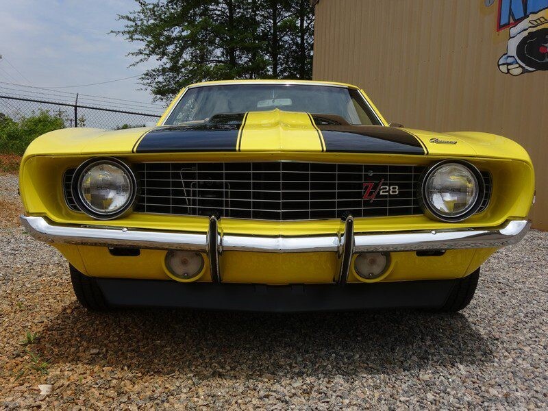 Yellow 1969 Camaro Z28 front view.