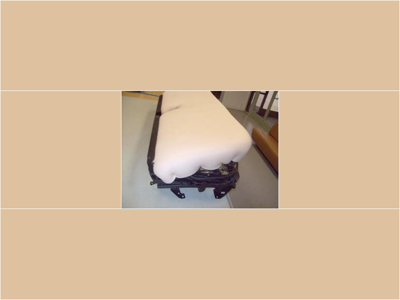 Here's an alt tag for the image: `Car seat foam and frame`