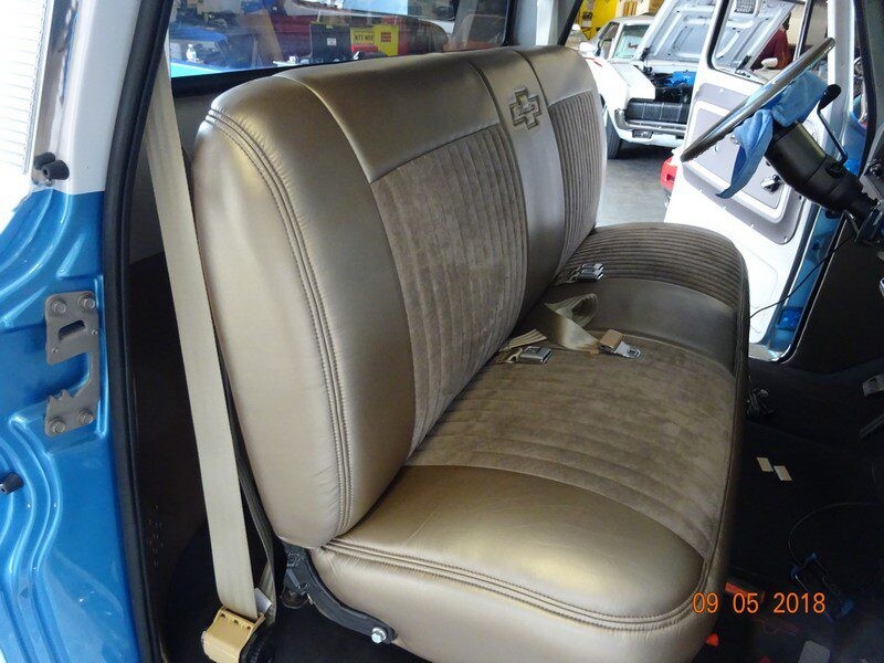 Beige truck seat, interior detail.