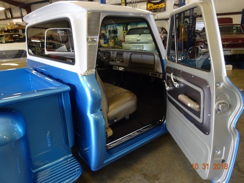 Blue and white classic Chevrolet truck.