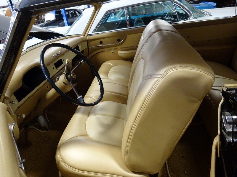 Beige leather interior of classic car.