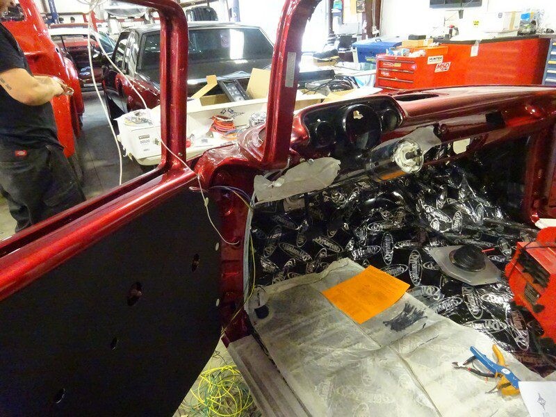 Red classic car interior restoration.