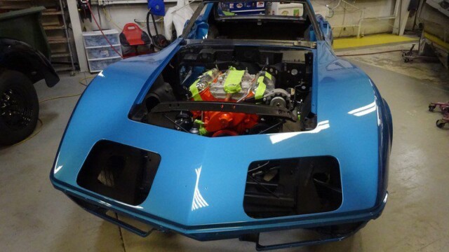 Blue Corvette engine bay restoration.