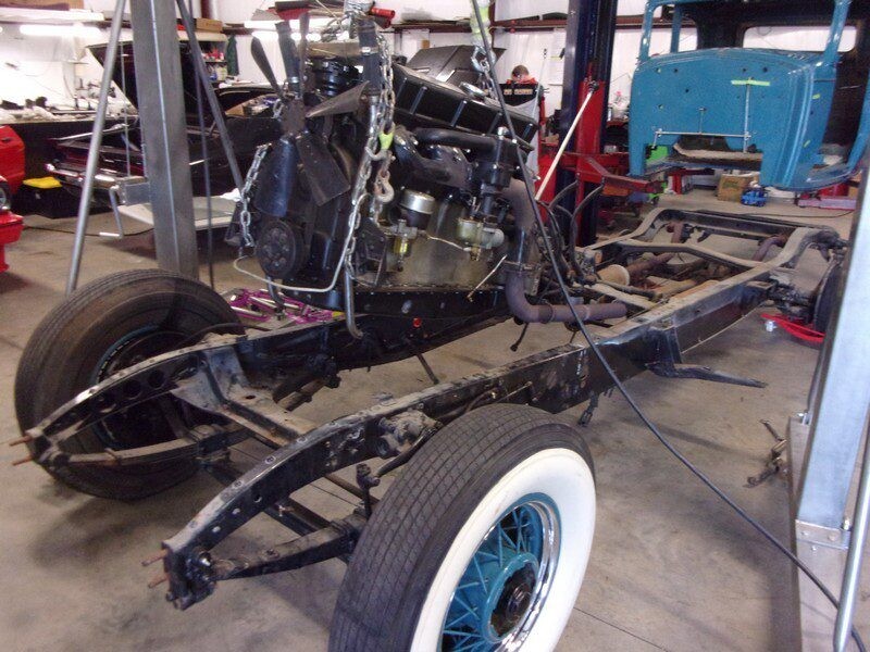 Classic car chassis under restoration.