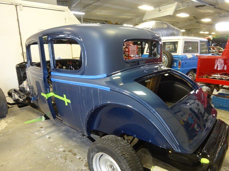 Blue vintage car body restoration.