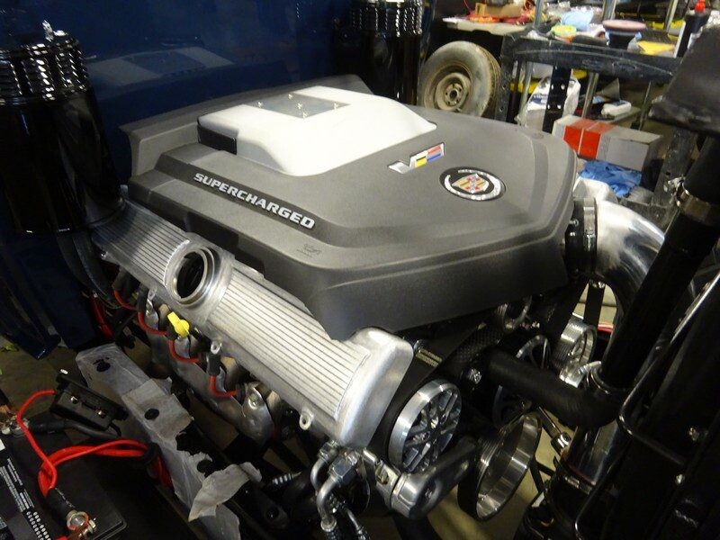 Supercharged Cadillac engine bay detail.