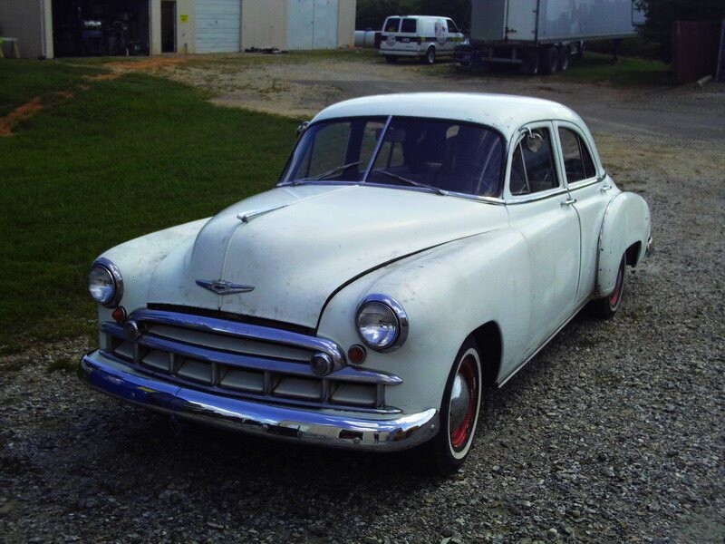 White vintage Chevrolet classic car.