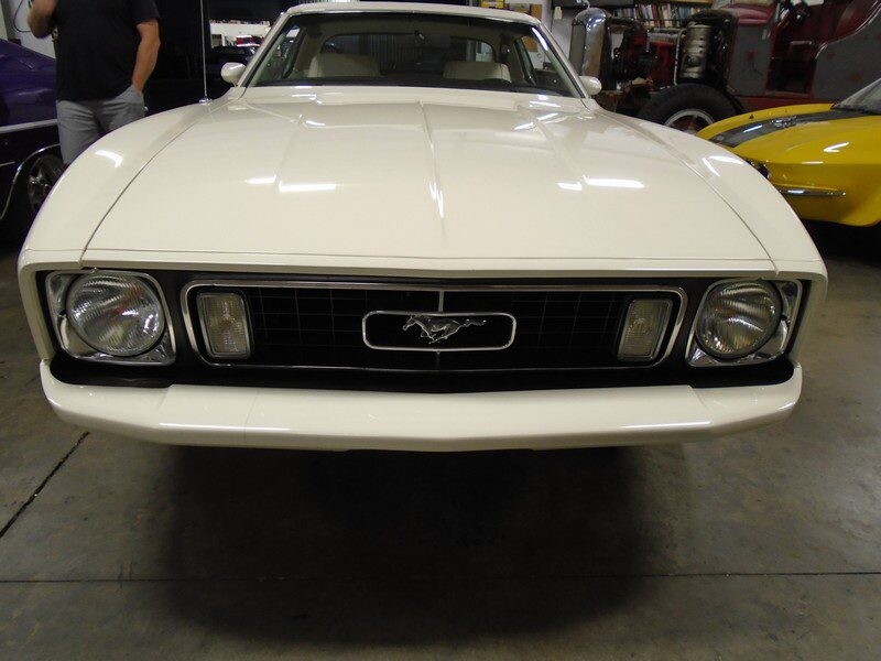 White Ford Mustang classic car front.