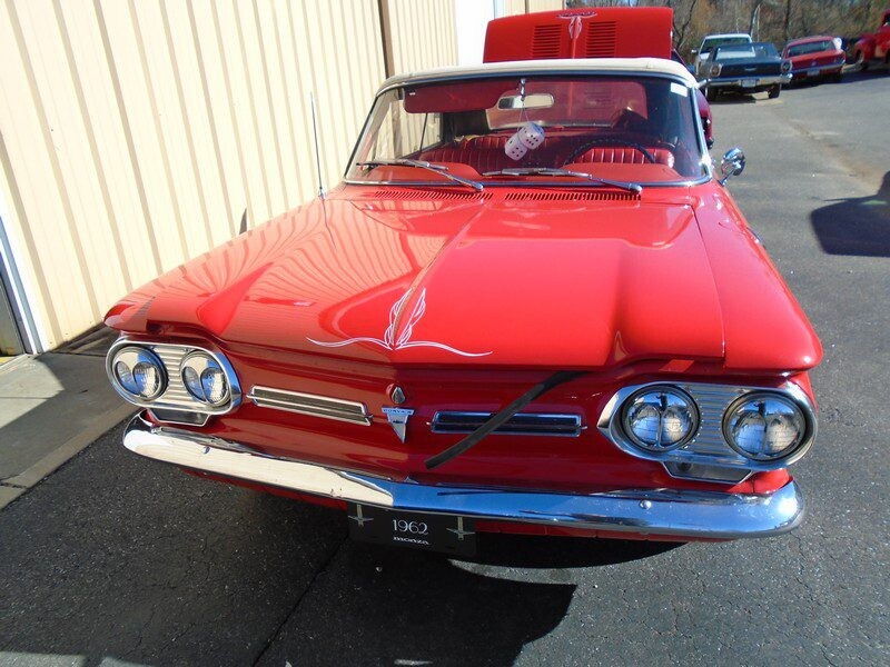 Red 1962 Corvair convertible classic car.