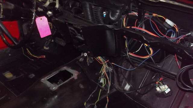 Car interior wiring during restoration.
