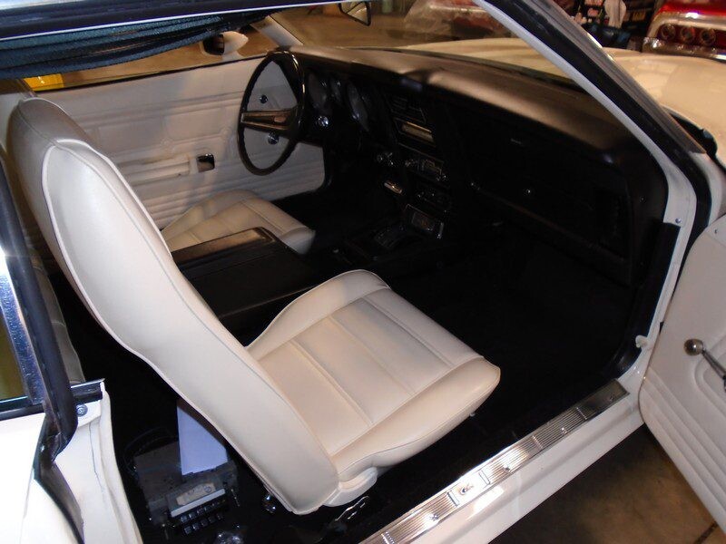 White interior of a classic Mustang.