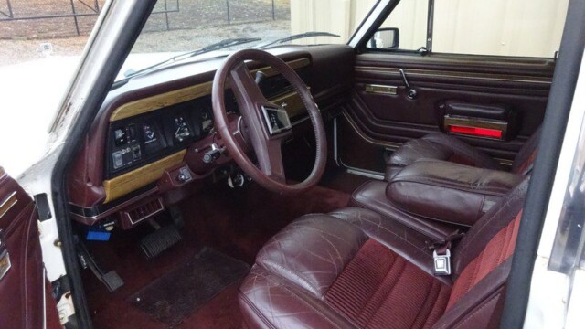 White Jeep Grand Wagoneer interior.