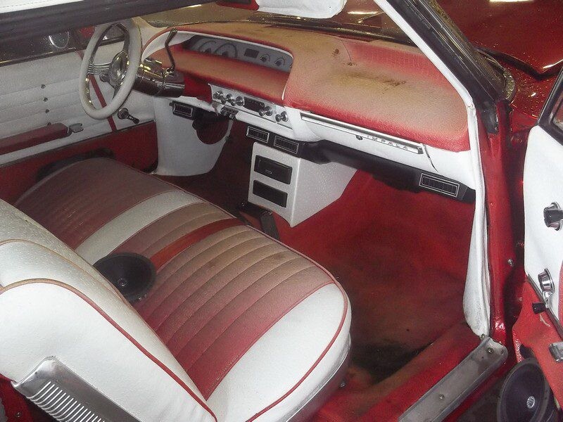 Red and white vintage car interior.