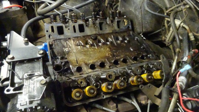 Dirty engine block with valve springs.