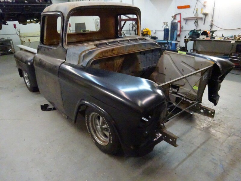 Black vintage truck body restoration.