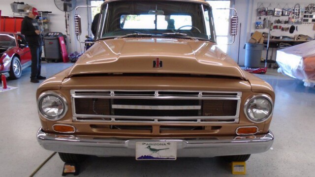 Here's an alt tag for the image: `Tan vintage International Harvester truck`