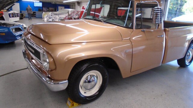 Gold vintage International Harvester pickup truck.