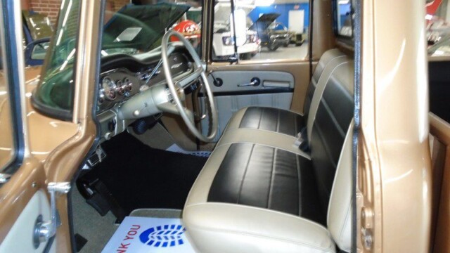Vintage brown truck interior, driver's side.