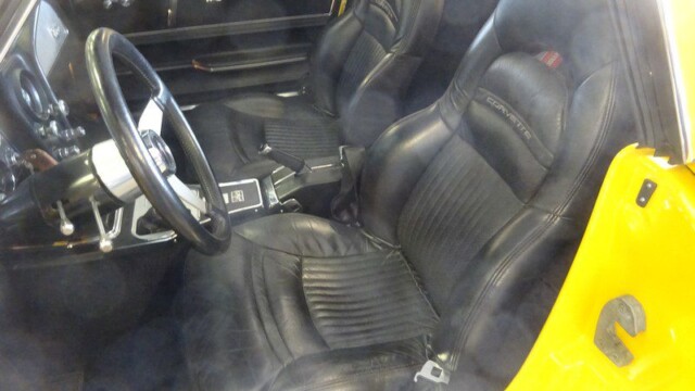 Yellow Corvette's black leather interior.