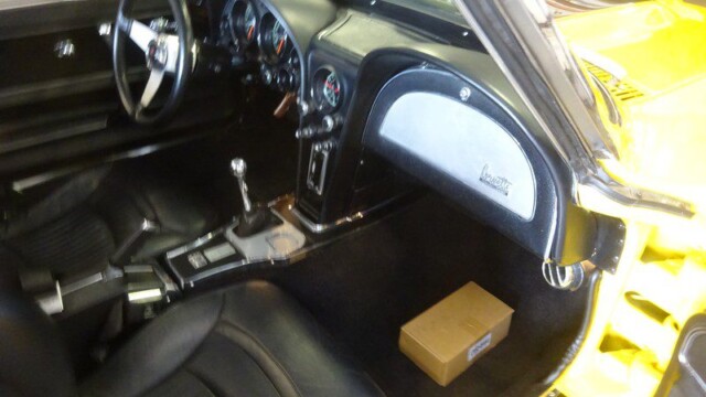 Yellow Corvette interior, driver's seat.