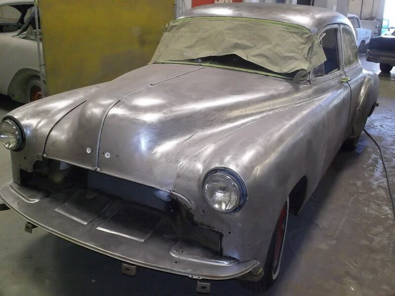 Bare metal classic car restoration.