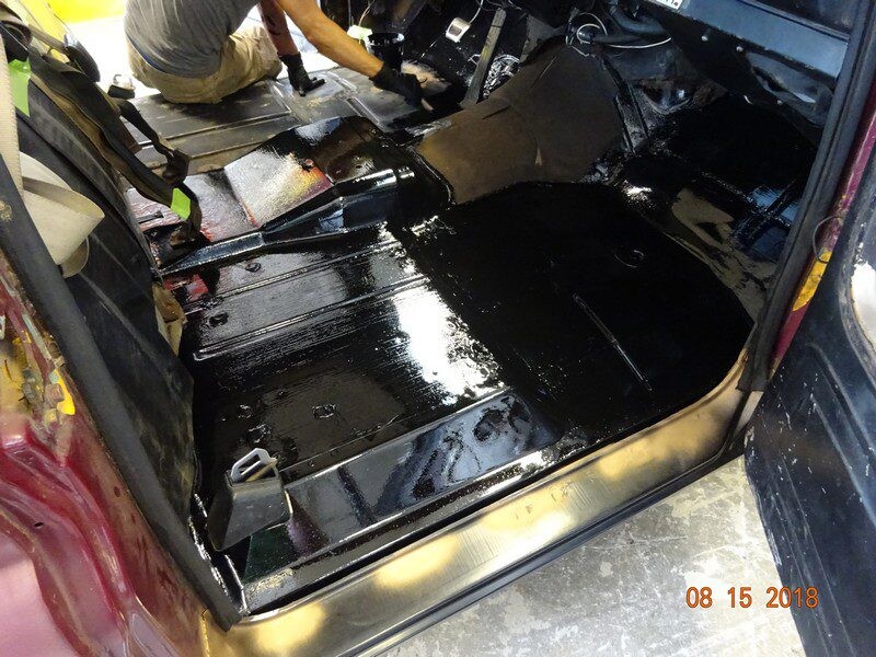 Car interior floor with black paint.