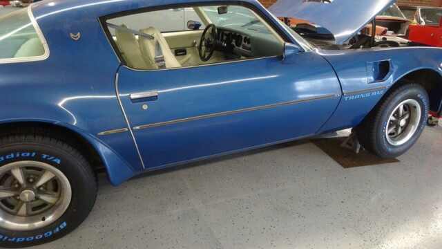 Blue Trans Am interior and door close-up