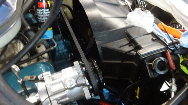 Car engine repair, air conditioning component.