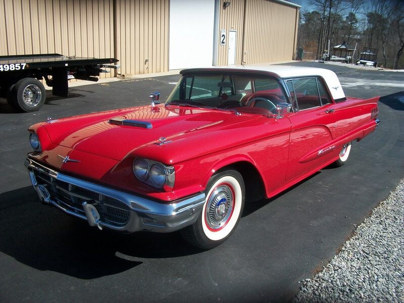 Red 1958 Ford Thunderbird classic car.