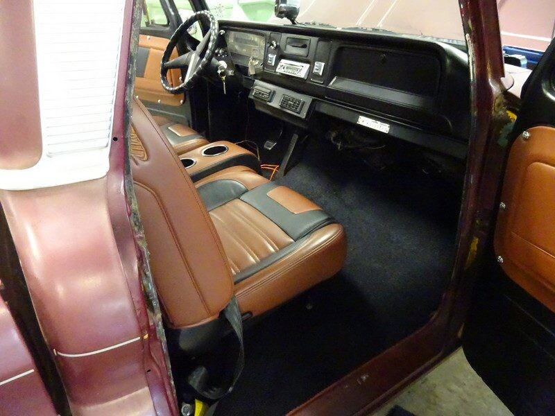 Custom brown interior of classic truck cab.