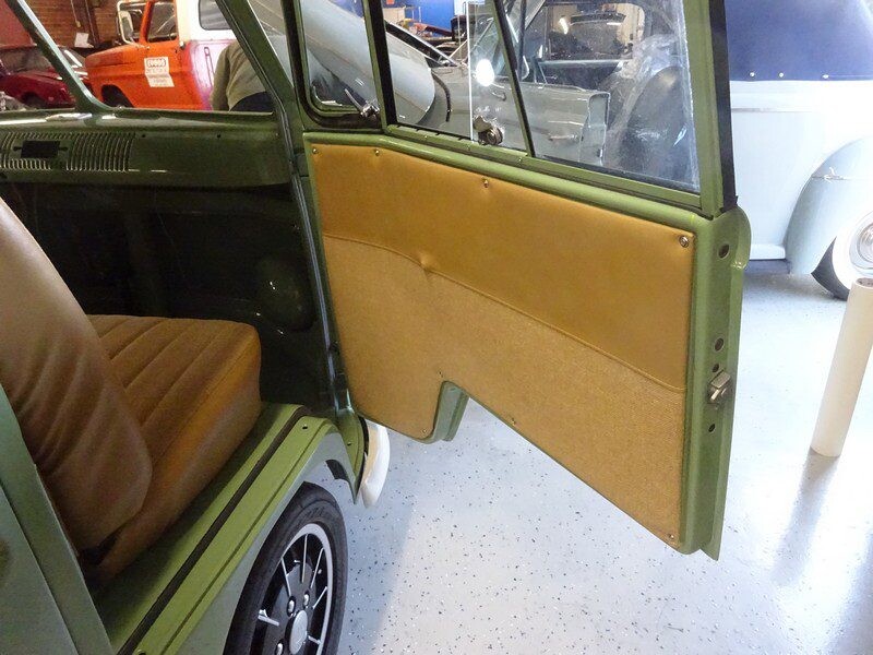 Green vintage VW bus interior door panel.