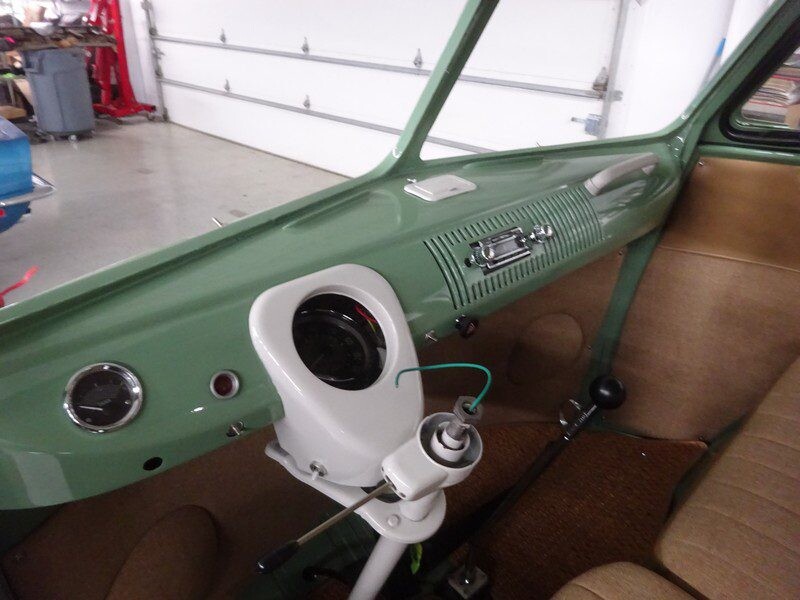 Green vintage VW bus dashboard interior.