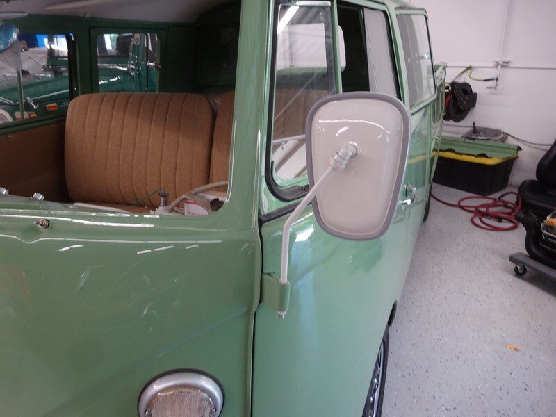 Green vintage VW bus side mirror.