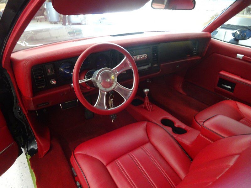 Red interior of a classic car.