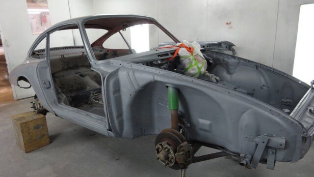 Gray Porsche 911 restoration in progress.