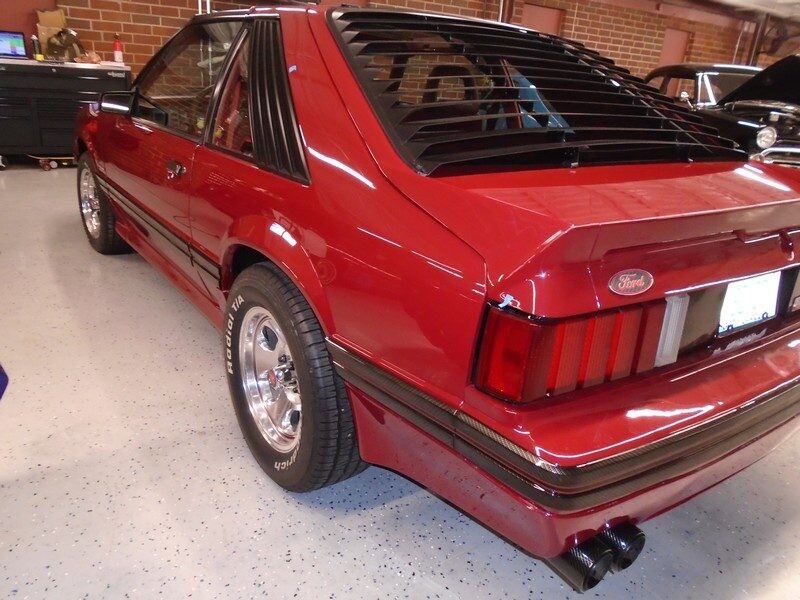 Maroon Fox-body Mustang GT with rear louvers