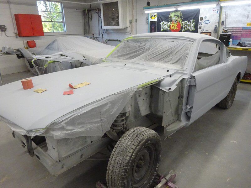 Classic Mustang fastback in gray primer on jack