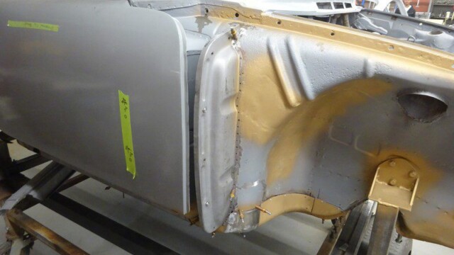 Car body in progress, restoration shop.