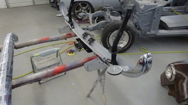 Classic car bumper restoration in progress.