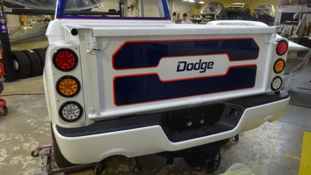 White Dodge truck rear, custom paint.