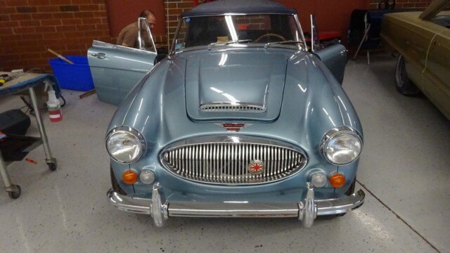 Front-facing Austin-Healey 3000 in workshop