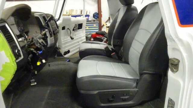Gray and black leather truck seats.