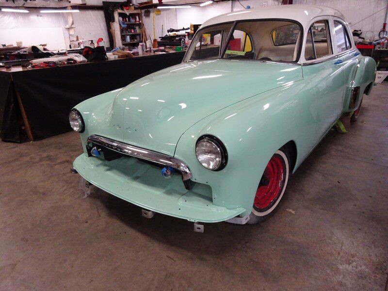Mint green classic car restoration.