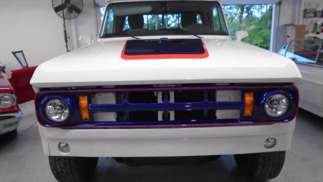 Custom white and blue Dodge pickup truck.